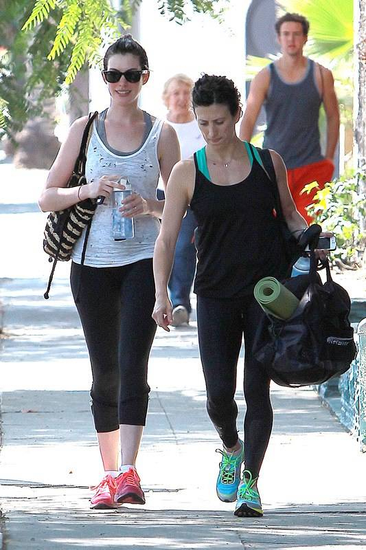 Anne Hathaway leaves the gym looking refreshed and happy