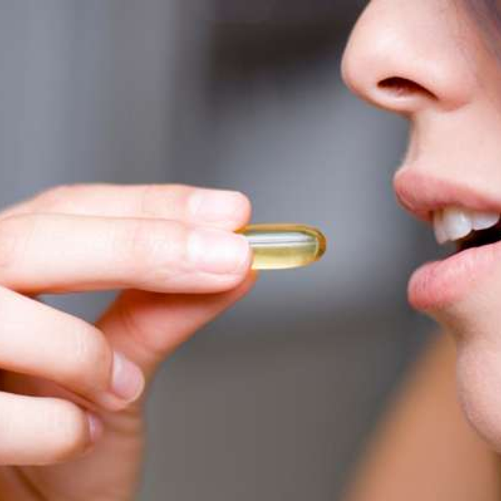 woman-taking-vitamin.jpg