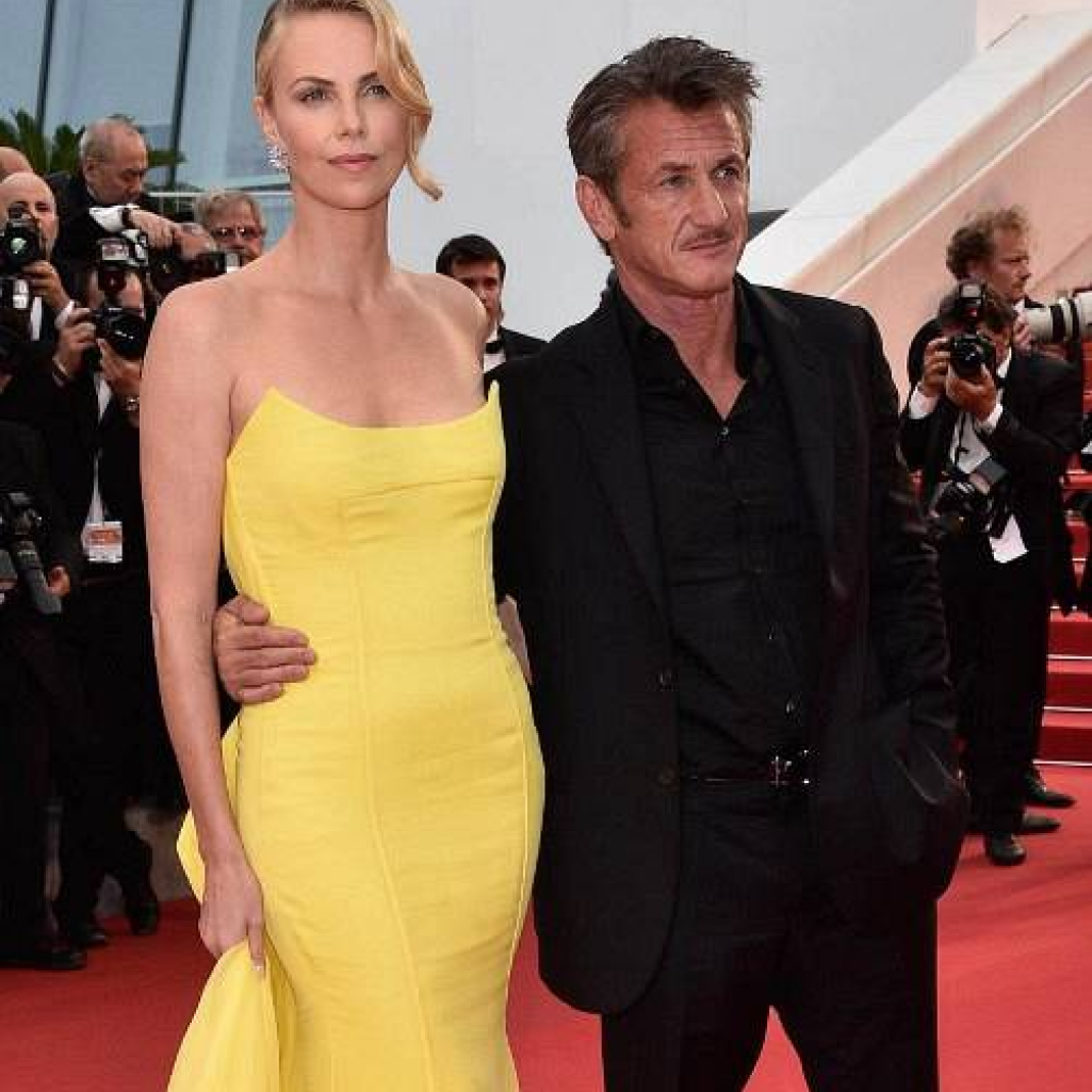 charlize-sean-cannes-14may15-01.jpg