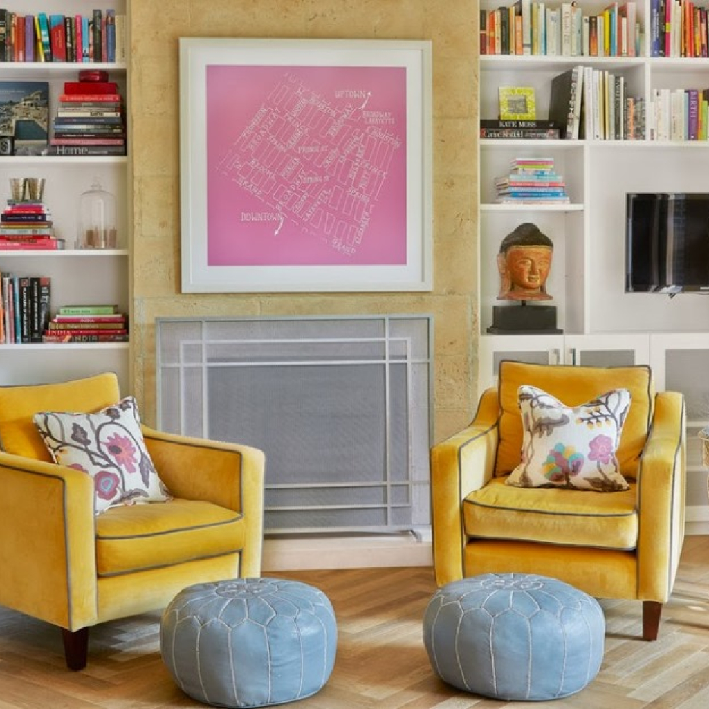 6adc4-living-room-mustard-velvet-lounge-chairs-blue-leather-poufs-custom-joinery-bookshelves.jpg