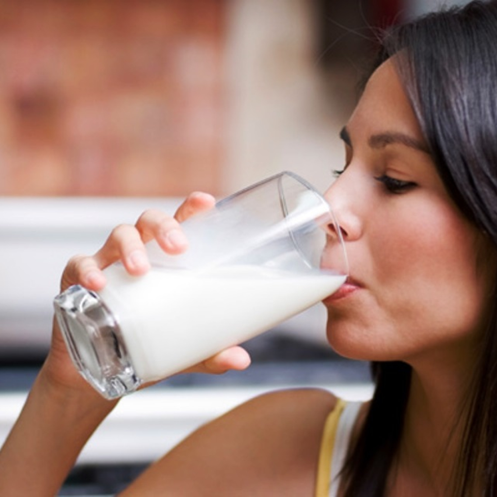 woman-drinking-tall-glass-of-milk.jpg