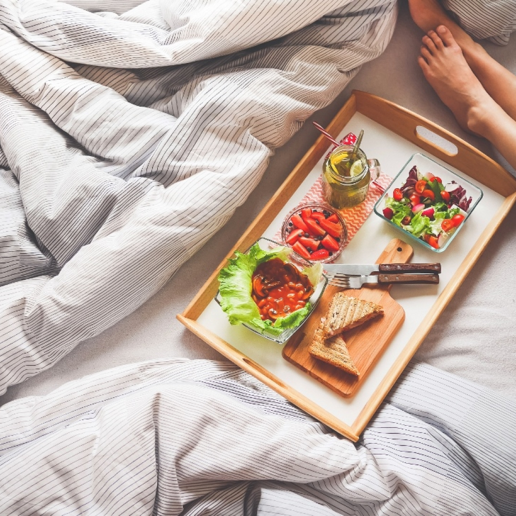 young-woman-enjoying-morning-breakfast-in-bed-picjumbo-com.jpg