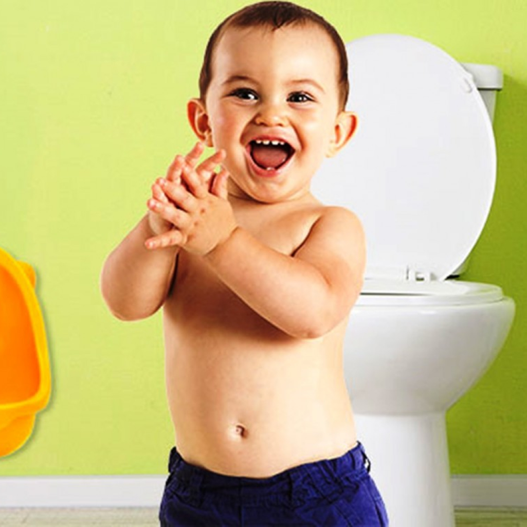 little-boy-about-to-use-a-potty-training-urinal.jpg