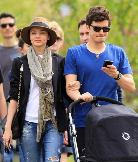 Orlando Bloom and Miranda Kerr take a romantic walk on the Highline with baby Flynn in stroller in NY