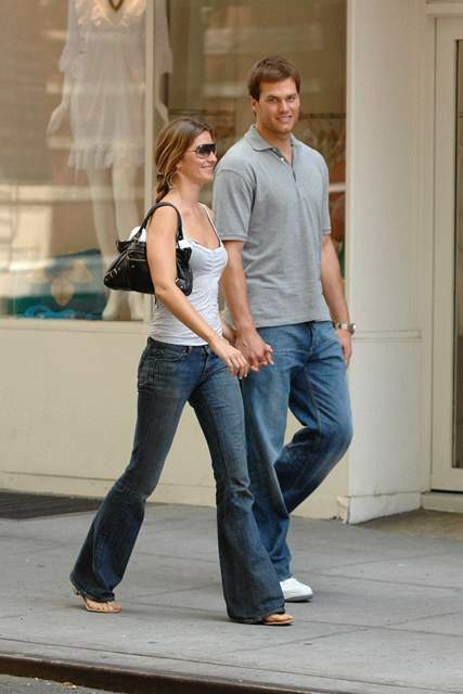 Supermodel Gisele Bundchen with her boyfriend Tom Brady out for a stroll in the West Village New York City Gisele s sister was also with them The shorter girl with white top On the way Tom Brady took a photo of Gisele with some girls r P rPictured