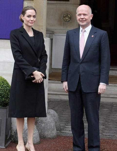 LONDON ENGLAND - APRIL 11 Angelina Jolie and William Hague attend the G8 summit at Lancaster House on April 11 2013 in London England Photo by Danny Martindale WireImage 