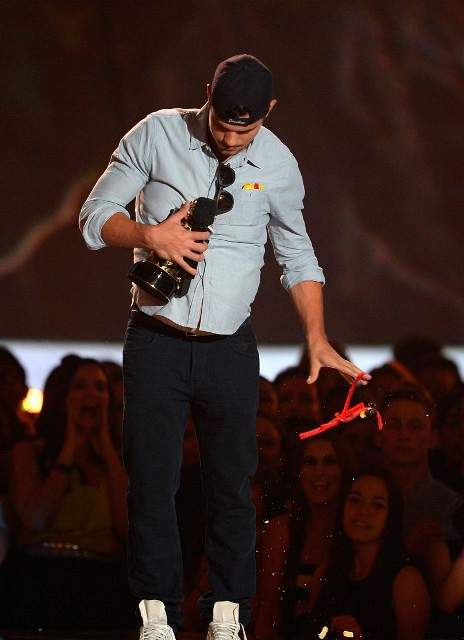 onstage during the 2013 MTV Movie Awards at Sony Pictures Studios on April 14 2013 in Culver City California 
