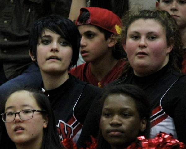 EXCLUSIVE Paris Jackson in full cheerleading attire shows her support for her school