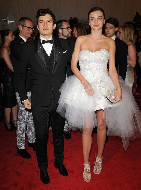 Arrivals at Costume Institute Gala benefit celebrating Alexander McQueen in NYC The event was held at the Metropolitan Museum of Art NYC r P rPictured Orlando Bloom and Miranda Kerr r P r B Ref SPL274091 020511 B BR rPicture by WUF Splash