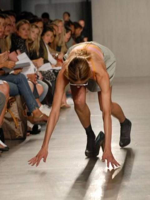 FILE - In this Sept  11  2006 file photo  a model trips and falls during the Proenza Schouler spring 2007 runway show during Fashion Week in New York   AP Photo Paul Hawthorne  File 