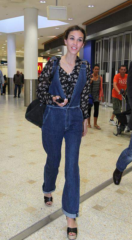 Alexa Chung shows dungarees are   in   as she arrives in Sydney  Australia