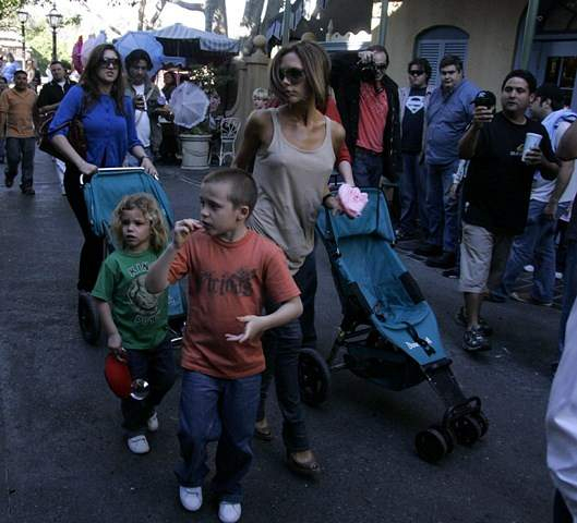 Victoria Beckham attempts to enjoy a nice Friday afternoon in sunny Anaheim  California by taking her two sons Brooklyn and Romeo for a day out at Disneyland and its companion park California Adventure  The former Spice Girl who is better known as Posh Sp
