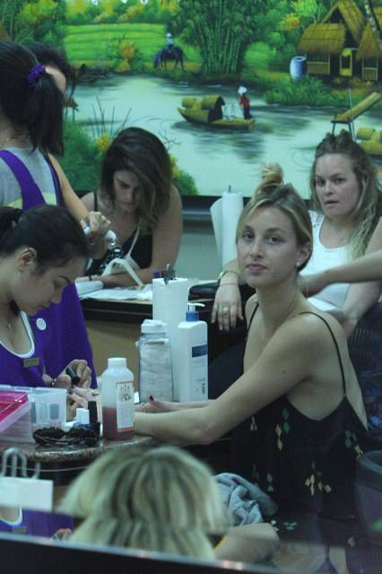 Actress fashion designer Whitney Port visits Beverly Hills Nail Design on Friday with her sisters and grandparents and got her mani pedi done by a few ladies in the salon Whitney opted for the darker nail color to contrast her fair skin r P rPicture
