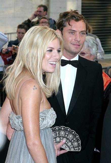 Sienna Miller and Jude Law arrive at the opening night of the Met Opera Season with Madame Butterfly simulcast in Times Square and Lincoln Center r P rPicture by Janet Mayer br r B Ref AFNY 250906 B B r P r B Splash News and Pictures B br 