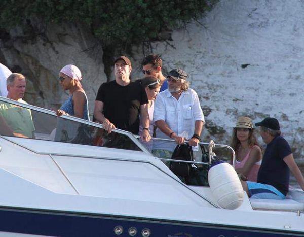 John Travolta and Robert de Niro leaving Skiathos Island