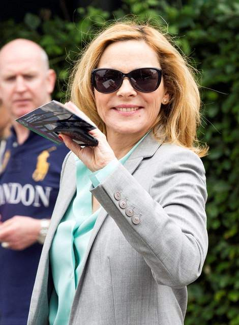 Actress Kim Cattrall is pictured arriving at the All England Lawn Tennis and Croquet Club to watch the 2013 Wimbledon championships r P rPictured Kim Cattrall r P r B Ref SPL572020 020713 B BR rPicture by Simon Earl Splash News BR r P P