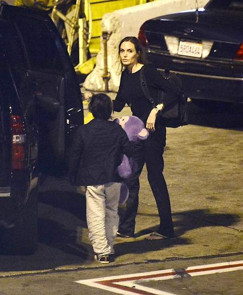 Angelina Jolie and Pax arrive into Los Angeles via LAX Airport on a flight from NYC