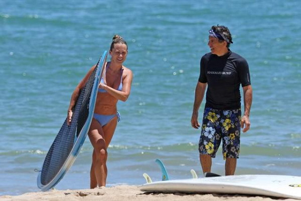 EXCLUSIVE  A shirtless Ben Stiller and bikini clad wife Christine Taylor enjoy a fun beach day with their two kids at home in Hawaii