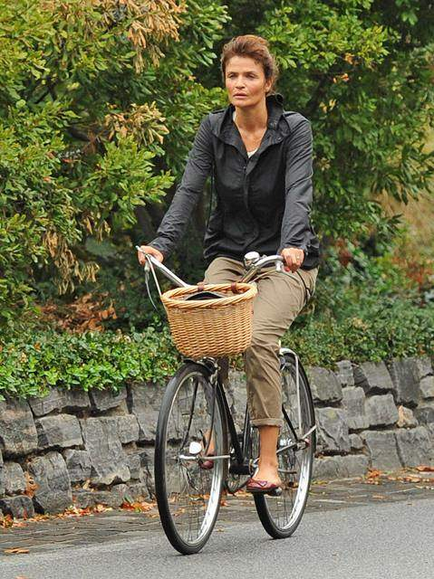 Helena Christensen rides a bicycle without make-up in New York City