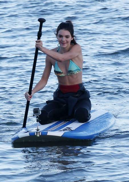 Kendall Jenner and brother Brody Jenner paddle boarding together in Malibu for Keeping up with the Kardashians 