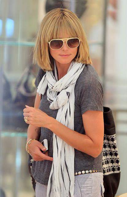 Heidi Klum shops at Barney s in NYC