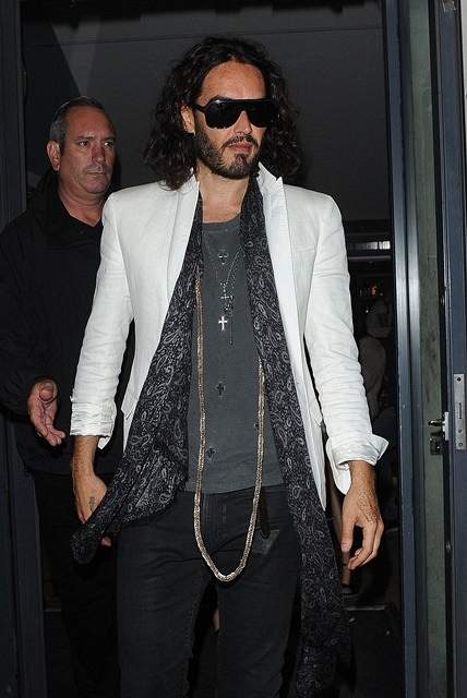 Russell Brand and mystery girl leaving the Soho Theatre in London