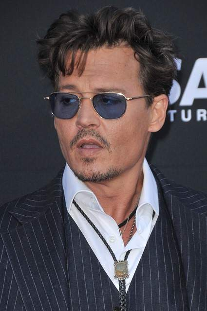 Johnny Depp arrives at the premiere of Walt Disney Pictures     The Lone Ranger   at Disney California Adventure Park on June 22  2013 in Anaheim  California   Photo by Ina Morin Splash  r P  rPictured  Johnny Depp r P  B Ref  SPL561333  220613    B  BR  