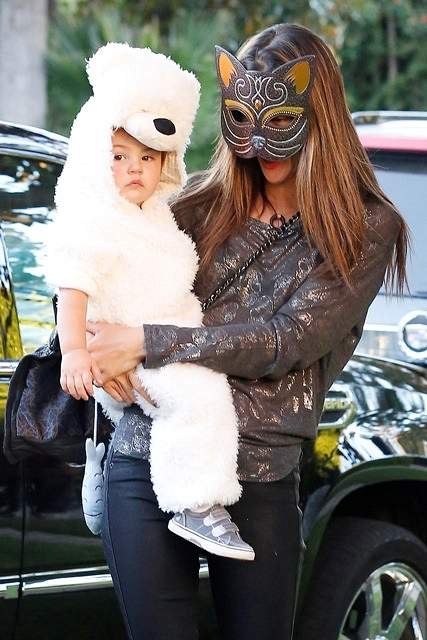 Alessandra Ambrosio trick or treating with her family in Santa Monica California