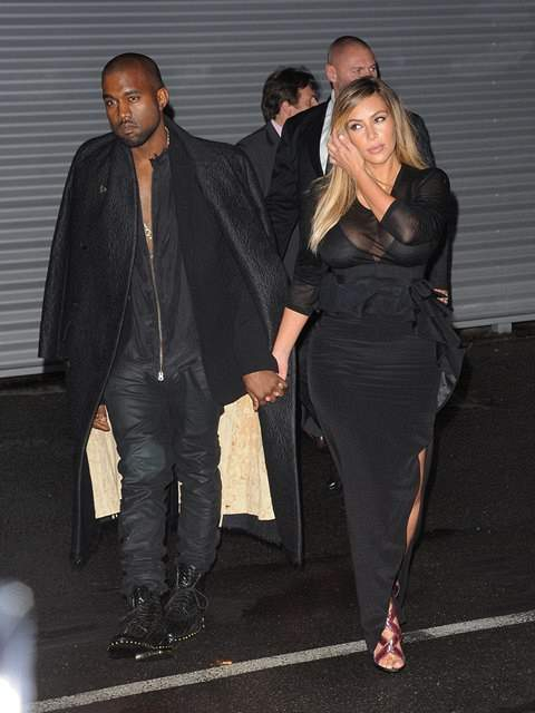 Kim Kardashian and Kanye West arrive at Givenchy Show during Paris Fashion Week