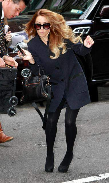 Lauren Conrad almost took a fall but graciously recovered as she arrived at her hotel in NYC