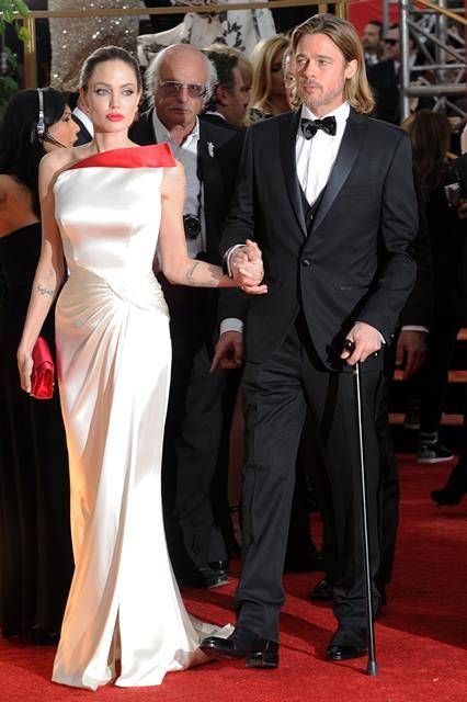 Angelina Jolie has to help injured Brad Pitt to walk on the red carpet at the Golden Globes  LA