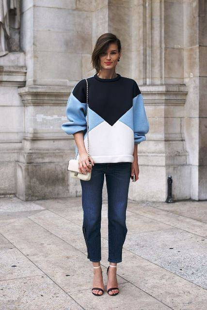PARIS  FRANCE - SEPTEMBER 30  Model and Fashion blogger Hanneli Mustaparta wears Tibi shoes  Chanel bag  and Stella McCartney jeans and jumper on day 7 of Paris Fashion Week Spring Summer 2014  Paris September 30  2013 in London  England   Photo by Kirsti