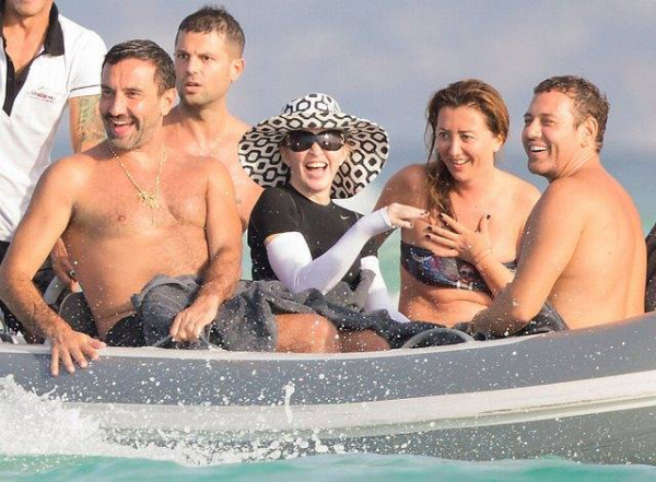 Madonna-surrounded-tan-friends-open-water