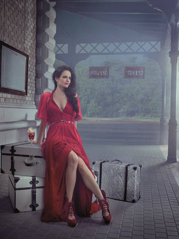 STARRING  Eva Green - OUTFIT  Andrew Gn cherry red hand-pleated silk mousseline dress with crystal appliqu    John Galliano red chiffon cape - COCKTAIL  MiTo