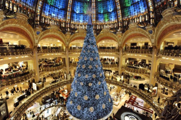 A picture taken on October 31 2012 at the Galeries Lafayette Paris department store shows a big Christmas tree decorating the central ground floor AFP PHOTO BERTRAND GUAY Photo credit should read BERTRAND GUAY AFP Getty Images 