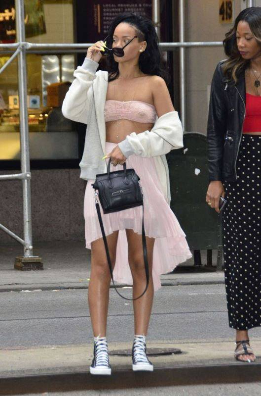 Rihanna rocking a see through shirt while out in New York City