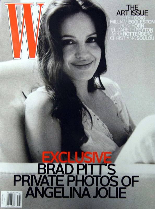 Angelina Jolie breastfeeding one of her twins on the November 2008 cover of W Magazine 