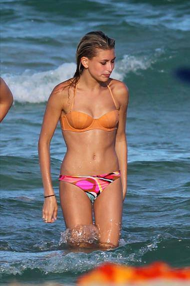Hailey Baldwin at the beach in a mismatched bikini in Miami