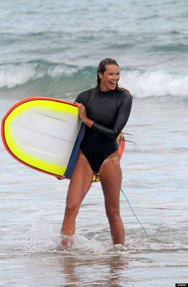 NON EXCLUSIVE PICTURE  GLENN REEVE   MATRIXPICTURES CO UK nPLEASE CREDIT ALL USES n nWORLD RIGHTS EXCEPT AUSTRALIA n nAustralian supermodel Elle MacPherson shows off her tan lines during a surfing session in Byron Bay  Australia  n nJANUARY 2nd 2012 n nRE