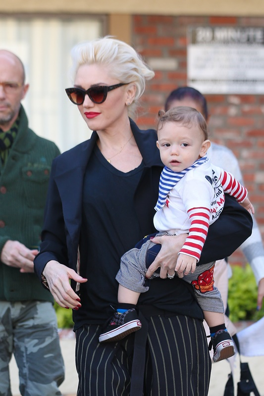 UK CLIENTS MUST CREDIT  AKM-GSI ONLY BR    rEXCLUSIVE  Part 2 - Gwen Stefani attends her acupuncture clinic appointment in Los Angeles with her son Apollo  The fashion designer  singer and mother of three wore black pin striped slacks with yellow loafers 