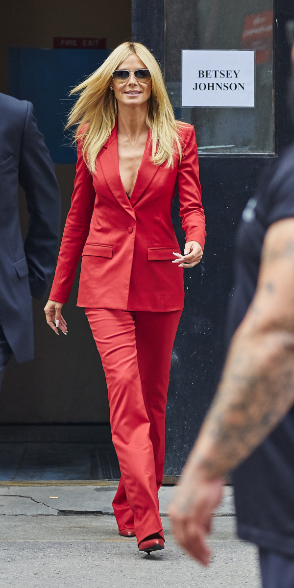 Heidi Klum spotted wearing red suit while departing the Project Runway fashion show during Mercedes Benz Fashion Week in NYC