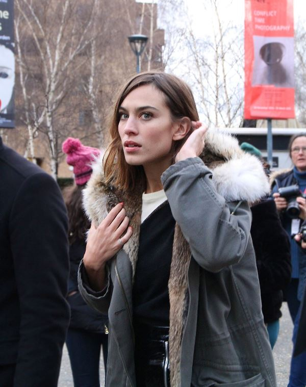 Side part hair.