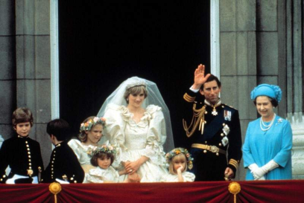 Just after the wedding of PRINCESS DIANA   PRINCE CHARLES  with Queen Elizabeth II   family  waving to the crowds from the window of Buckingham Palace  July  1981 