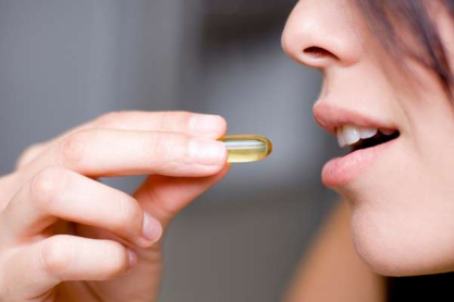 woman-taking-vitamin.jpg