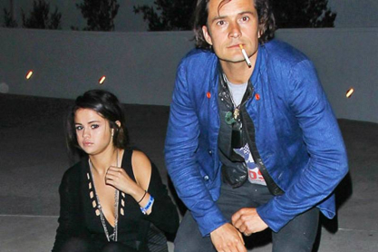 1398702533_selena-gomez-orlando-bloom-lg.jpg