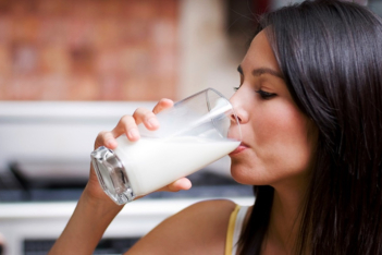 woman-drinking-tall-glass-of-milk.jpg