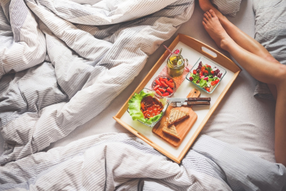 young-woman-enjoying-morning-breakfast-in-bed-picjumbo-com.jpg