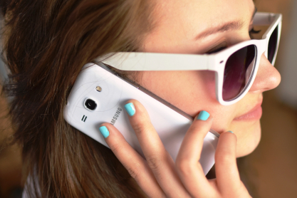 person-sunglasses-woman-smartphone.jpg
