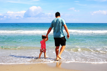 father-daughter-beach-sea-38302.jpeg
