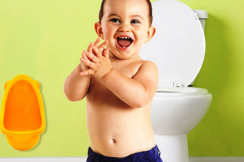 little-boy-about-to-use-a-potty-training-urinal.jpg